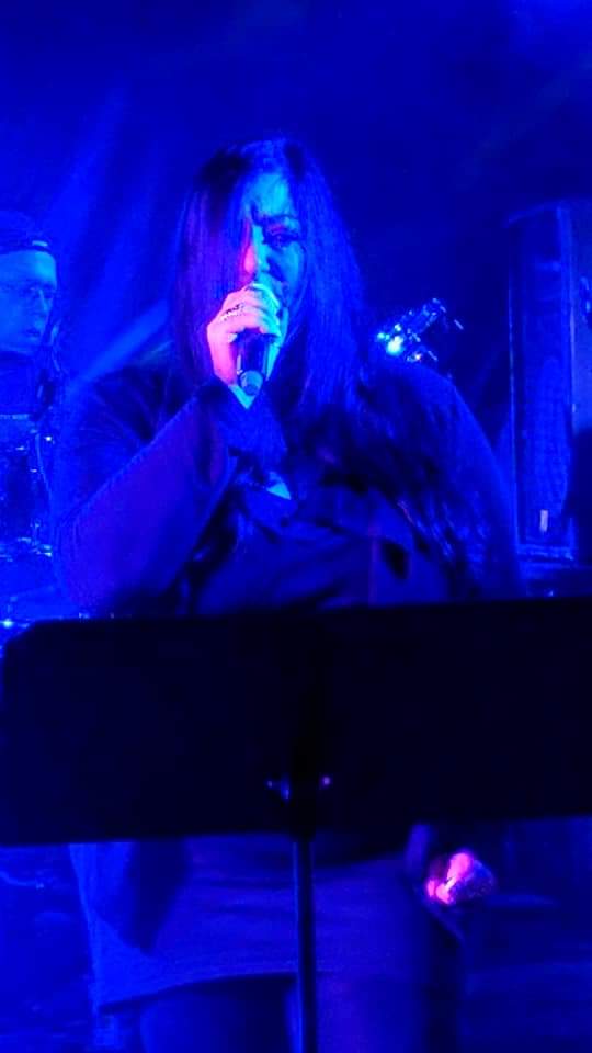 Evie under the blue lights